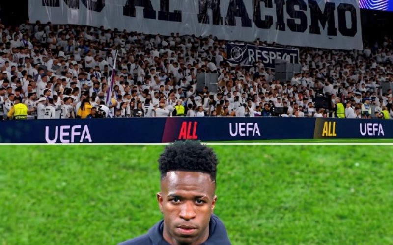 Torcida do Real Madrid exibe faixa contra racismo em apoio a Vinícius Júnior antes de jogo